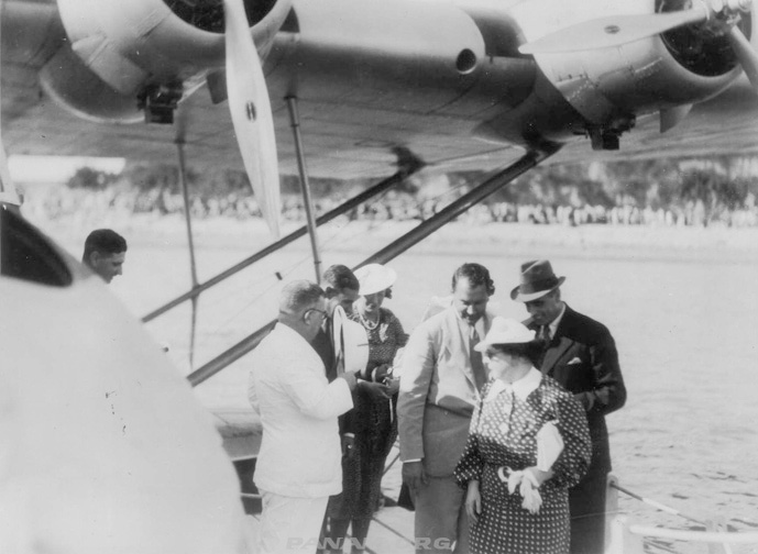Betty Trippe( back left) & Juan Trippe (in hat ) disembark the Philippine Clipper PAHF Frances Bixby Coll