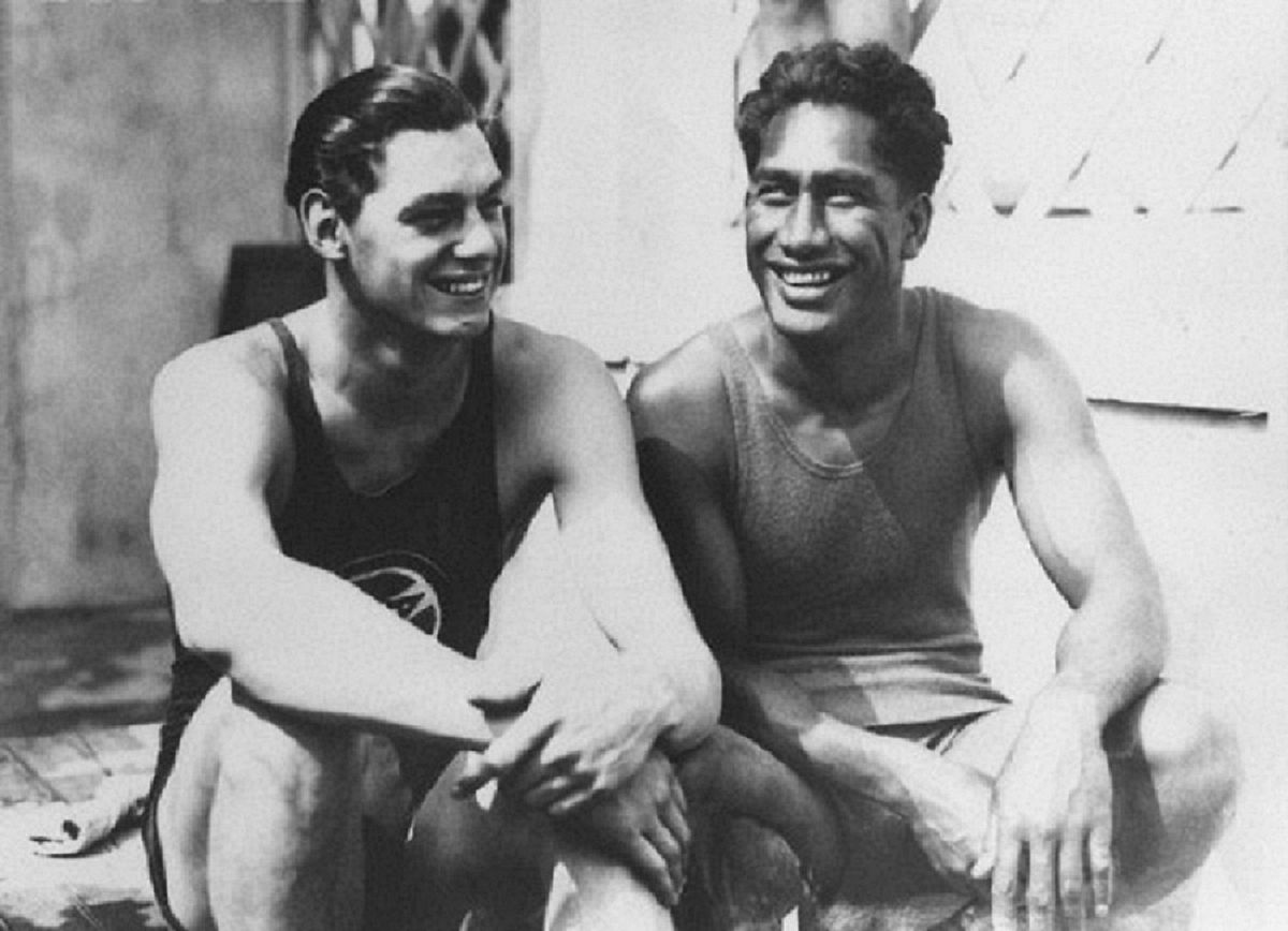 Duke Kahanamoku (R with) another Champion Olympic swimmer Johnny Weissmuller (L ), 1924, Wikimedia