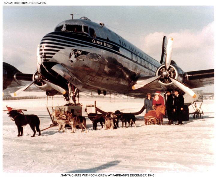 Pan Am Douglas DC-4 crew poses with Santa Claus in Fairbanks, Alaska, 1946