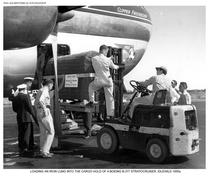 Pan Am Boeing 377 loading iron lung at Idlewild Airport New York